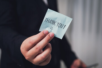 Grateful hand gesture thank you note delivery professional business setting