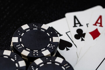 Obraz premium Casino chips and cards on the table. Gambling concept