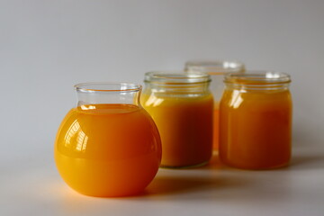 Homemade Cow Ghee. A clarified butter made by slow heating butter, creating a golden, clear liquid with a rich aroma