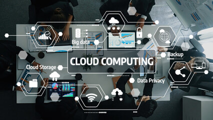 A dynamic overhead view of a cloud computing meeting, featuring professionals analyzing data, collaborating on innovative solutions, and enhancing business productivity. Amity