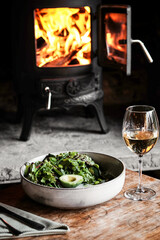 Enjoy a Cozy Dining Experience by the Warm Fire with