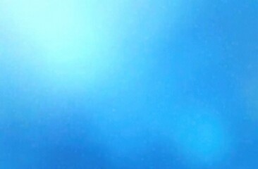 Abstract blue background with soft gradients and blurred textures, creating a serene and calming atmosphere suitable for various design projects and creative applications