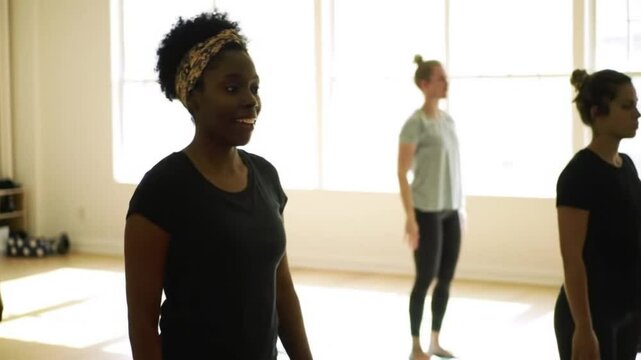 Group fitness class stretching and workout routine for health and wellness exercise program