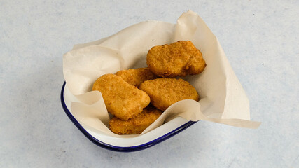 Indulge in Delicious Chicken Nuggets Presented in a Simple, Charming