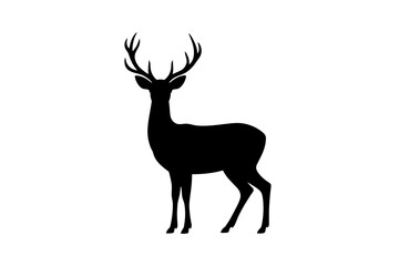Silhouette of a deer with large antlers standing