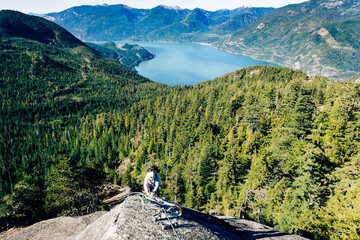 Climber on a cliff, Via Ferrata, Sea to Sky , Squamish, British Columbia, Canada