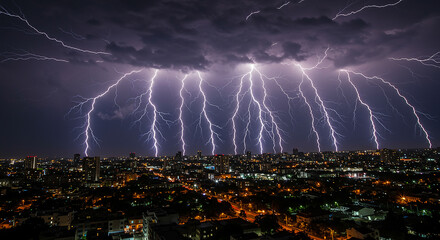 Many lightnings over the city at night