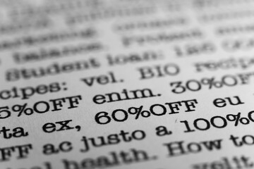 Fototapeta premium 60 percent off. Text printed on a page. A piece of paper with a phrase. Marketing.