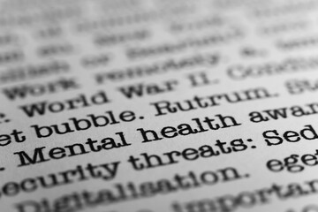 Mental health awareness. Text printed on a page. A piece of paper with a phrase written in retro...