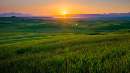 Obraz premium Dramatic mountain landscape at sunrise or sunset, featuring a panoramic view of misty hills and cloud-kissed peaks under a vibrant sky