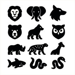 wild animals icon collection. black vector silhouettes of lion, elephant, bear, shark, owl, giraffe, rhino, wolf, snake and more.