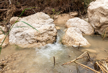 Small  waterfall downstream in the Arugot Stream Nature Reserve near Dead Sea in the southern Israel