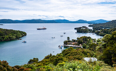 Harbour stewart island new zealand with cruise ship in the water