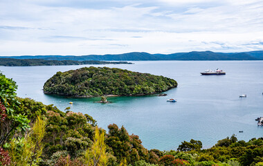 Harbour stewart island new zealand with cruise ship in the water