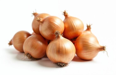 Fototapeta premium Pile of fresh golden onions on white background. Raw, organic bulbs perfect culinary ingredient. Healthy diet food, vegetable isolated. Cooking, gastronomy concept.