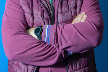 Psychological pose, arms crossed on the chest in a lock. Middle aged man