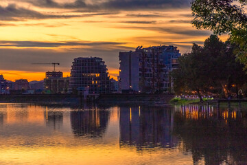 Sunset over the Parku i Madh Lake in the Grand Park of Tirana,  Albania