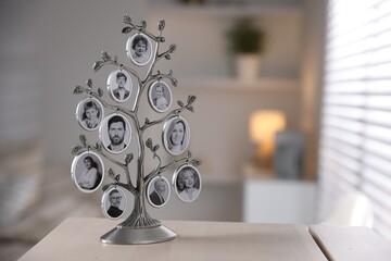 Family tree photo frame on wooden chest of drawers indoors. Space for text