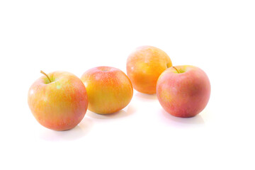 fuji apples on a white background