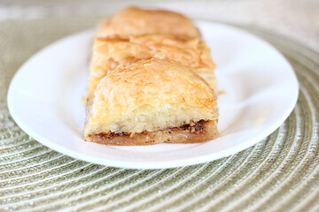 sweet baklava in a plate on the table