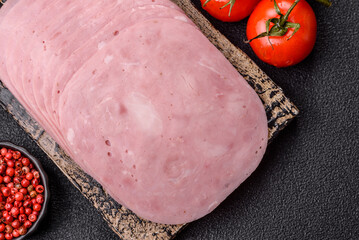 Sliced ham, meat or pork sausage for sandwiches. Cooked smoked prosciutto, ham