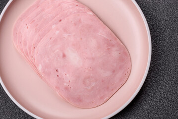 Sliced ham, meat or pork sausage for sandwiches. Cooked smoked prosciutto, ham