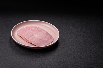 Sliced ham, meat or pork sausage for sandwiches. Cooked smoked prosciutto, ham