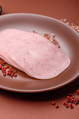Sliced ham, meat or pork sausage for sandwiches. Cooked smoked prosciutto, ham