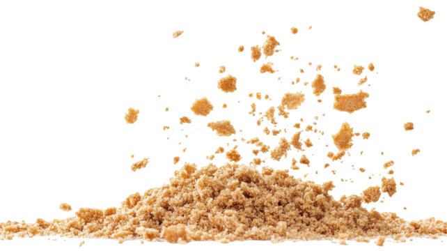 Pile of Cake Crumbs and Flying Cookie Pieces Isolated on White Background
