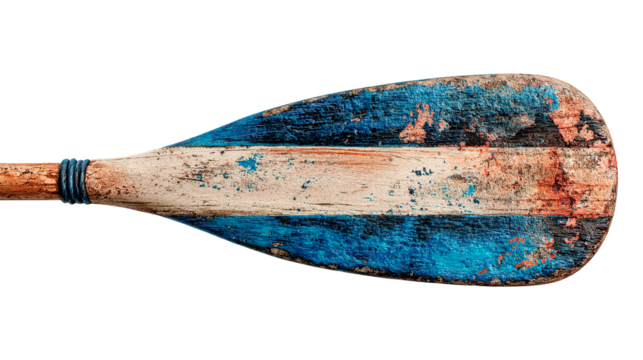 Weathered wooden oar with peeling blue and white paint, perfect for nautical themes.