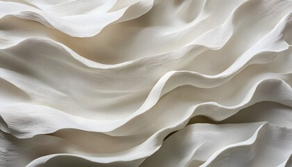 Abstract sculpted waves of creamy white.