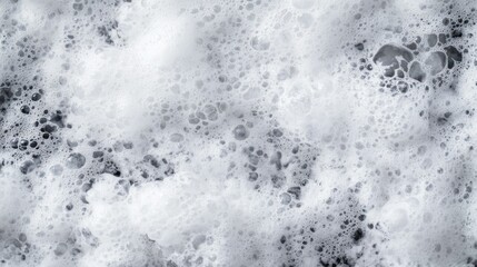 A detailed close up image of bubbly white foam texture