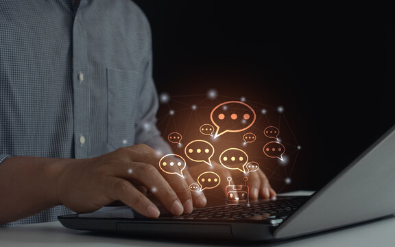 Businessman chatting with AI assistant bot through live message on laptop for client service and information support in digital business technology online communication using AI live chat conversation
