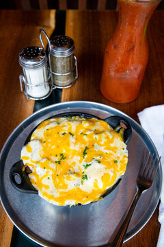 Pizza dough balls covered with cheese	