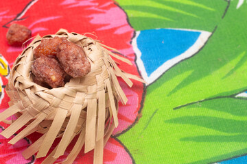mini straw bowl with peanuts - Brazilian June festival