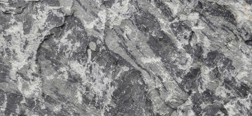 Grey rock surface with natural texture