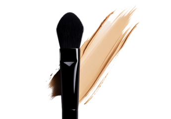  brush with liquid foundation on the background of white paper, the color is beige and bla