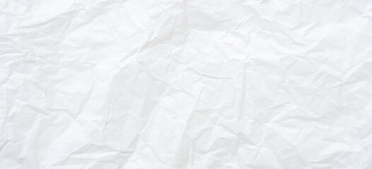 Obraz premium Top view and full frame of wrinkled or crumpled white paper texture used as crumpled white paper background texture in decorative art work.