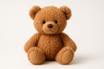 Obraz premium Adorable fluffy brown teddy bear toy sitting upright isolated on a pristine white background creating a classic and heartwarming image of childhood comfort.