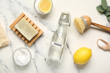Composition with natural products and supplies for cleaning on light background