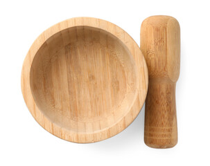 Wooden mortar with pestle isolated on white, top view