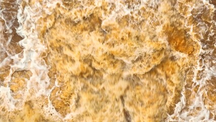 Drone captures turbulent brown floodwaters rushing downstream, highlighting the dynamic force of nature and the role of floods in shaping river ecosystems.
