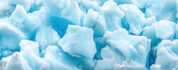 Obraz premium Close-up of jagged blue ice chunks, showcasing the texture and cool tones of frozen crystals.
