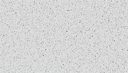 Obraz premium Textured Stone Surface: A close-up shot showcasing a textured stone surface with a consistent pattern of tiny specks that creates a sense of depth and complexity. 
