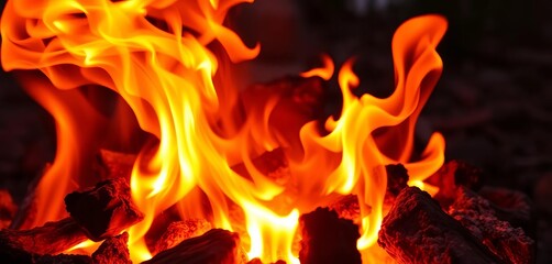 Fototapeta premium Close-up of a vibrant, swirling campfire, embers glowing intensely, close-up, shadow