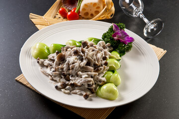 Stir-fried chicken with egg and seafood mushrooms