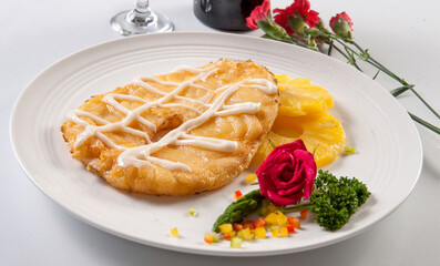 Pineapple slices with fried cod