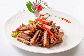 Fried donkey meat with bell peppers