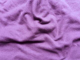 Fototapeta premium Close up of a crumpled blanket. The appearance of the blanket on the bed in the morning.