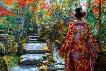 Japanese Woman in Traditional Kimono Dress at Hosen-in temple with colorful autumn gardens in Ohara, Kyoto, Japan